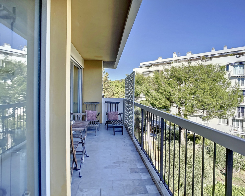 Top-floor apartment with a large terrace and views of the sea and hills.